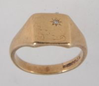 A 9ct gold hallmarked signet ring with foliate decoration and single star set diamond approx 2pts.