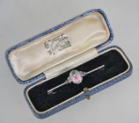 An Art Deco white metal brooch set with a central faceted Murano floral stone with marcasite