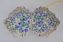 A large white metal plique a jour set nurses buckle with foliate decoration. Measures 12cms.