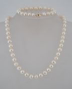 A 10ct gold and pearl bracelet and necklace set.