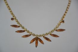 A vintage 1950's rhinestone prom necklace set with marquise and round cut yellow and amber stones
