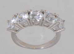 A silver 5 stone cz ladies impressive dress ring, the 5 stones being claw mounted. Total weight 5.