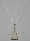 An Art Deco style silver & opal pendant and necklace chain having silver surround, clasp and chain.