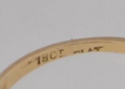 An 18ct gold ring set with 5 diamonds in a gypsy settings approx 20pts. Marked 18ct Plat. Weight 2.