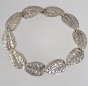 A 925 silver bracelet in the form of overlapping leaves with invisible hook fastening. Marked 925.