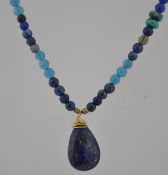 A Lapis Lazuli pendant bead necklace by Nakamol Chicago. Measures 18 inches.