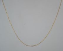 A 14ct gold link chain necklace with spring hoop clasp. Tests 14ct gold. Measures 18 inches.