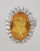 A large 1970's vintage silver cocktail ring set with a golden yellow topaz. Spanish silver marks.