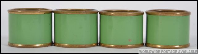 Four rare BILSTON copper enamel napkin r