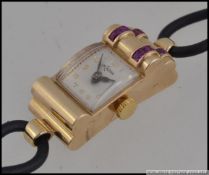 An Art Deco hallmarked 9ct gold and ruby