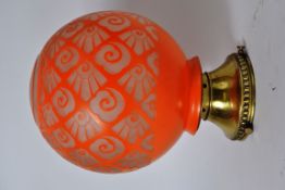 A Bohemian Art Deco globe lamp shade wit