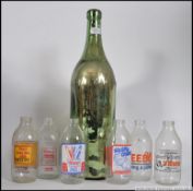A vintage large Martini glass bottle of