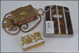 A faux tortoiseshell cigarette case and