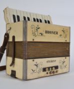 A vintage 20th century cased Hohner No 2