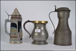 A vintage 20th century pewter quart meas