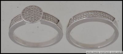 A silver and CZ engagement ring and matc