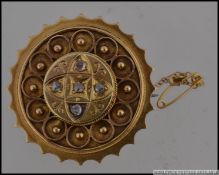 A tested 9ct gold plus and diamond Victo