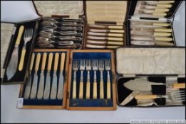 A collection of assorted flatwares to in