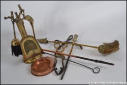 A mixed collection of copper and brasswa