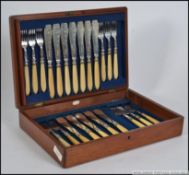 An Edwardian mahogany cased 6 place cant