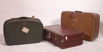 A stack of retro and vintage suitcases,