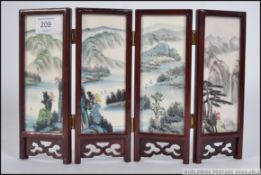 A 20th century miniature handpainted har