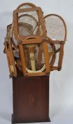 A large collection of 20th Century vintage badminton and tennis rackets