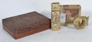 A 19th Century Oriental bone carving depicting an Elder along with a stone carved incense holder