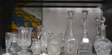 A collection of early 20th Century cut glass decanters with stoppers