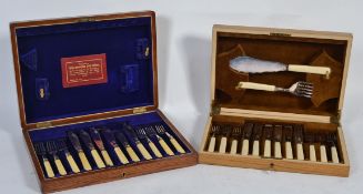 An Edwardian cased canteen of cutlery being awarded in 1919 along with another cased example