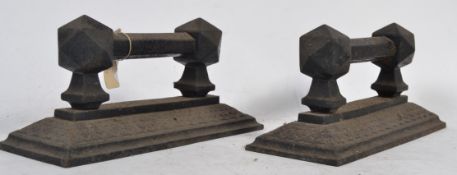 A pair of cast iron Victorian door stops