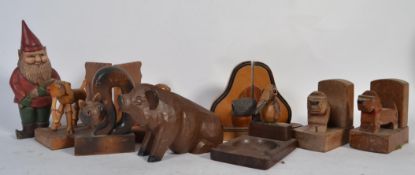 A good group of novelty bookends to 1930s elephant and carved dog examples along with a novelty