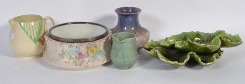 A collection of pottery to include Beswick examples and a pair of Bretby leaf dishes