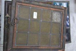 A pair of 19th century leaded stained glass windows