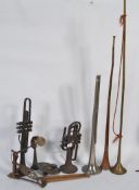A collection of 20th Century musical instruments to include long horns ,
