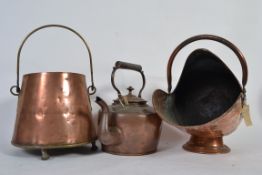A large 19th Century copper kettle along with a coal bucket and a coal scuttle