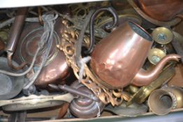 A collection of brasswares to include teapots, waterpots,