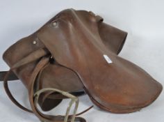 A large collection of equestrian wares and horse leather to include leather saddle,