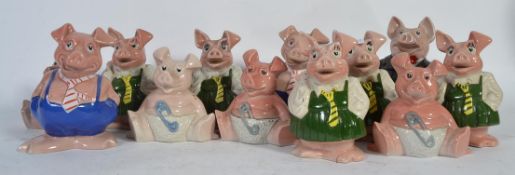 A collection of Wade Natwest piggy bank moneyboxes