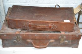 A vintage 20th century leather suitcase along with another leather case of Masonic origin with