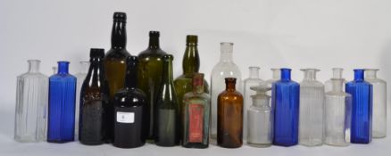 An assortment of vintage glass bottles to include Bristol blue examples,
