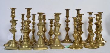 10 pairs of Victorian candlesticks of varying forms and sizes