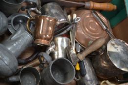 A collection of silver plate and pewter part tea services along with a copper pan and various flat