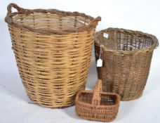 A collection of early 20th Century wicker to include laundry basket , paper bin etc.