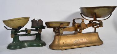 Two sets of vintage weighing scales both made in England one being a Victor set - with weights