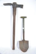 A 20th Century military issue shovel stamped with a crows foot along with a good 20th century