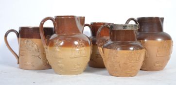 A collection of Victorian harvest wear to include a 19th Century twin handled loving cup and
