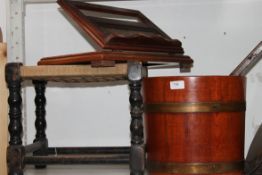 A vintage footstool along with a coopered barrel,