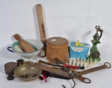 A collection of kitchenalia to include butter paddles , a cork kitchen storage jar , rolling pin ,