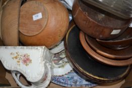 A good collection of 20th Century carved wooden items to include bowls , pots , jugs etc.